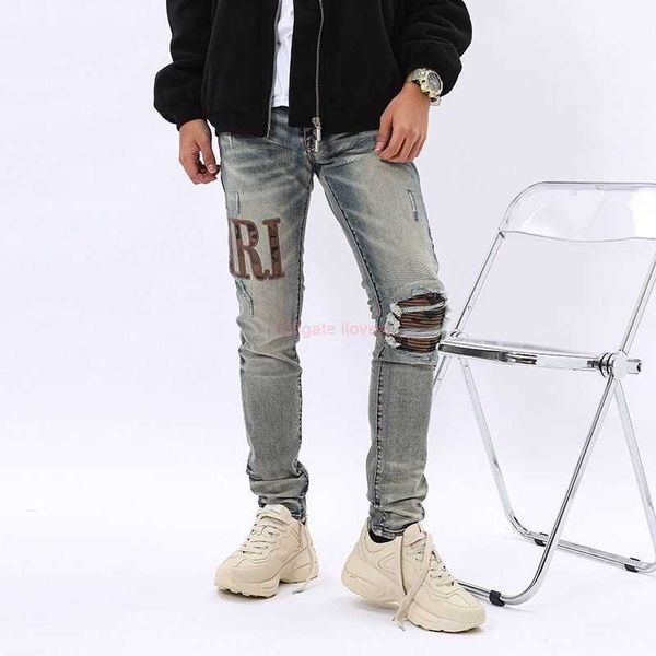 Jeans Designer Clothing Amires Jeans Pantalon denim Nouvelle marque High Street Amies Made Old Patch Patch Knee Hole Camo Patch Slim