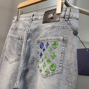 Brand de mode de printemps pour hommes de créateur de jeans coréen slim-fit slim fit épais brodé de tendance bleu