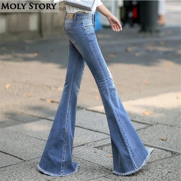 Jeans mode nouveau vintage super flare jeans sexy midle riping ripped jeans femme plus taille hippie large jambe denim pantalon femmes