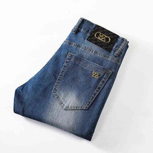 Jeans hommes printemps et été lavage mince élastique Version coréenne petit Tube droit taille moyenne coupe ajustée pied pantalon hommes