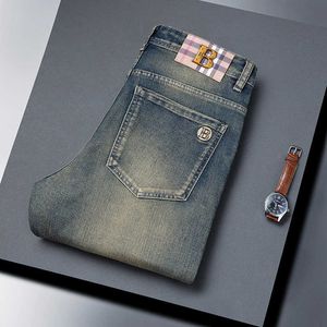 Jeans Mens Automne et hiver épais brodés coréennes de la version coréenne jeune slim slim fit élastique pantalon long