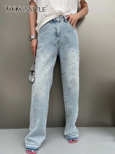 Jeans Twotwinstyle Patchwork Broidered Flares Jeans pour femmes High Waist Bouton Slim Pantal