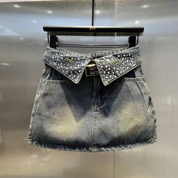 Jeans Womenswear designer V incrusté de diamants taille haute jupe en jean moulant la mode short en jean Caprise skinny