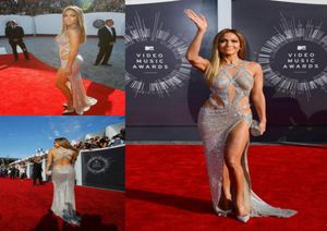 Jennifer Lopez Robes de bal sexy luxueuses et abordables avec bretelles croisées fendues et paillettes dos nu argentées tapis rouge de célébrité Go6128362