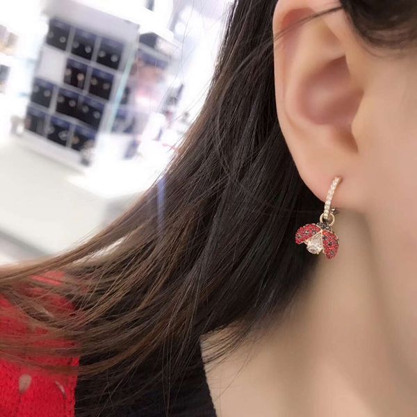 Bijoux swarovskis oreilles créateurs femmes de qualité originale de qualité de luxe charme de mode battant coeur sept boucles d'oreilles élément élément de ladytouche cristalline