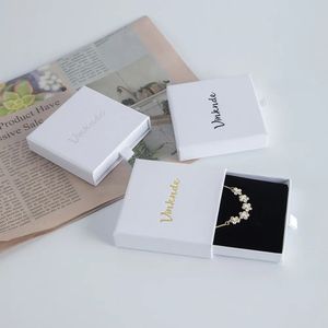 Cajas de joyería 50 piezas de cartón personalizado joyería anillo collar caja de almacenamiento de regalo cajón deslizante paquete de papel caja blanca cartón con esponja negra 231023