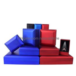 Cajas de joyería Pendientes Anillo Joyería Caja de embalaje Caja con LED iluminado para propuesta Compromiso Joyería Regalo Gota Entrega Packin Dhmlu