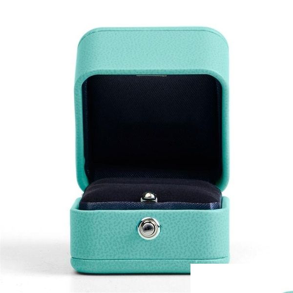 Boîtes à bijoux Fanxi Blue Pu Collier en cuir Boîte-cadeau Emballage Bague Organisateur T200808 Drop Livraison Emballage Affichage Dhzuh