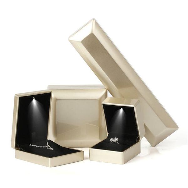 Cajas de joyería Caja de luz LED Anillo Collar Caja de almacenamiento de regalo Exhibición de compromiso Joyería Pulsera Colgante Embalaje Entrega de gota Ot7Hk