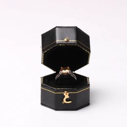 Sieradendozen Mini zwarte achthoekige doos PU leer geavanceerde vintage sieraden display aanbevolen bruiloft diamanten ringdoos 231120