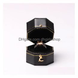 Sieradendoosjes Mini zwarte achthoekige doos Pu-leer Geavanceerd vintage display Aanbevolen diamanten ring Drop Delivery Verpakking Dhcrv