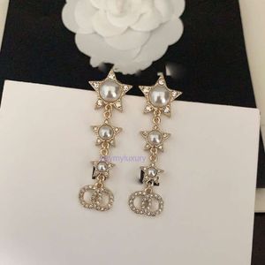 Boucles d'oreilles du canal de bijoux Personnalités diamants complets perles cinq étoiles pointues boucles d'oreilles de longueur moyenne pour femmes