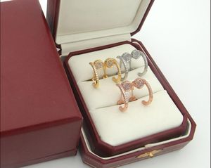 Sieraden ontwerper charme titanium staal vrouwen mannen nageloorring diamant-gepaved gouden bandaccessoires