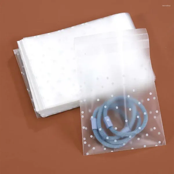 Pochettes à bijoux 100pcs givré point blanc transparent auto-adhésif sacs d'emballage OPP multi-taille pour paquet cadeau collier bracelet biscuits