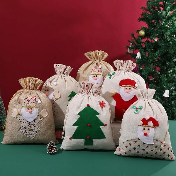 Bolsas de joyería 10 unids / lote 30 40 cm Feliz Navidad Gran Cordón Algodón Lino Regalo Lindo 3D Santa Claus Copo de nieve Bolsas Almacenamiento en el hogar