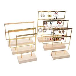 Stand de bijoux Nouveau espion d'oreille à trois couleurs de gâchis de gâchis de gâchis en bois Storage en métal avec divers trous Q240506