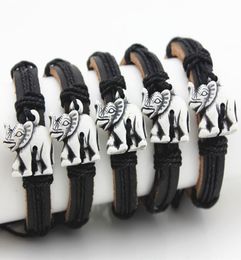 Bijoux entiers 12 pièces Imitation os de Yak sculpté Style Tribal éléphants chanceux Bracelets en cuir bracelet de surf cadeau chanceux MB1533299643