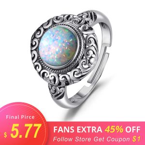 JewelryPalace Vintage 1.5ct Ronde Cabochon Created Opal Carving Heart Ring Open Regelbare 925 Sterling Silver Rings Sieraden