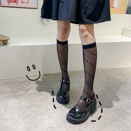 Chaussettes de mollet de style jk coréen version collégiale de style collégial à tube à tube à tube à tube pour femmes chaussettes en mailles respirantes légères sur les chaussettes de genou