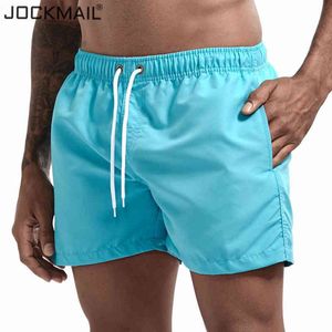 JOCKMAIL Short de bain pour homme Séchage rapide 2020 Summer Holiday Beach Surf Pocket Maillot de bain Sport Running Hybird Shorts Y220420