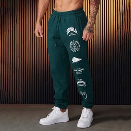 Jogger hommes pantalons de survêtement Style américain vêtements pour hommes Gym sport Fitness coton pantalons décontractés imprimé taille moyenne pantalon à cordon 240123