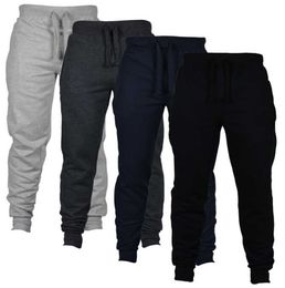 Pantalones de chándal Joggers ajustados Camuflaje Hombres Nueva moda Pantalones Harem Pantalones largos de color sólido Pantalones de hombre