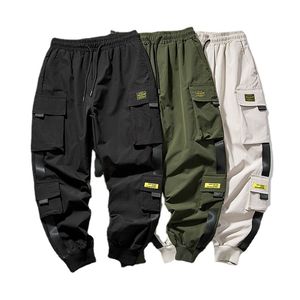 Joggers vrachtbroek voor mannen Casual hiphop pocket mannelijke broek voor joggingbroek streetwear linten techwear 220815