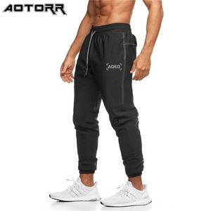 Joggers mannen sport broek lente slank dunne fitness broek mannen effen kleur multifunctionele outdoor sport broek heren casual broek x0615