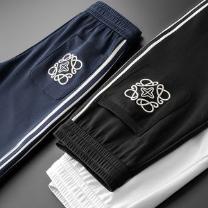 Joggers Sweat Pantalons de survêtement Pantalons Hip Hop 3 Couleurs Mode Brodé Bande Latérale Hommes Femmes Pantalon Long Cordon High Street M-4XL