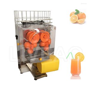 Machine industrielle d'extraction de jus de fruits, presse-agrumes Orange frais, presse-agrumes
