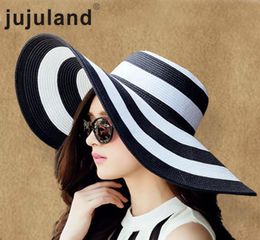 Jujuland 2018 Nuevo Verano Mujer Sombreros para el sol Sombrero con visera Gran ala Negro Blanco Sombrero de paja a rayas Gorras de playa al aire libre ocasionales para mujeres C1908122965