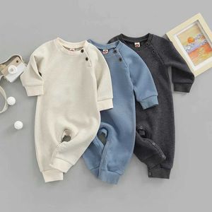 Jumpsuits 0-24m baby jongens herfst romper baby solide kleur lange mouw wafel jumpsuits pasgeboren peuter kleding y240520o92w