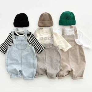 Jumpsuits para niños Corea Cortae Cause Childrens Grandeja Grandeja Denim ropa de bebé Pantalones para niños y niñas Y240520Ujns