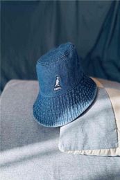 Marca de marea vintage de Kangol Kangaroo Washed Tannin Denim Fisherman Hat for Women and Men Summer Big Brim Flat Top Basin Hat Unisex H3830297