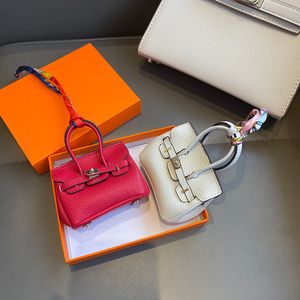 Llavero Mini bolsos de diseñador Accesorios para bolsos Funda para Airpods Estuches protectores para auriculares Mini bolsos para mujer Monedero para dama Bolsa para lápiz labial