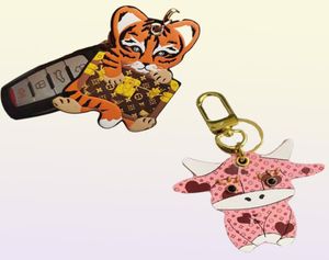 Porte-clés classique taureau rose taureau tigre en cuir porte-clés mode mignon dessin animé téléphone portable sac voiture porte-clés pendentif accessoires5393556