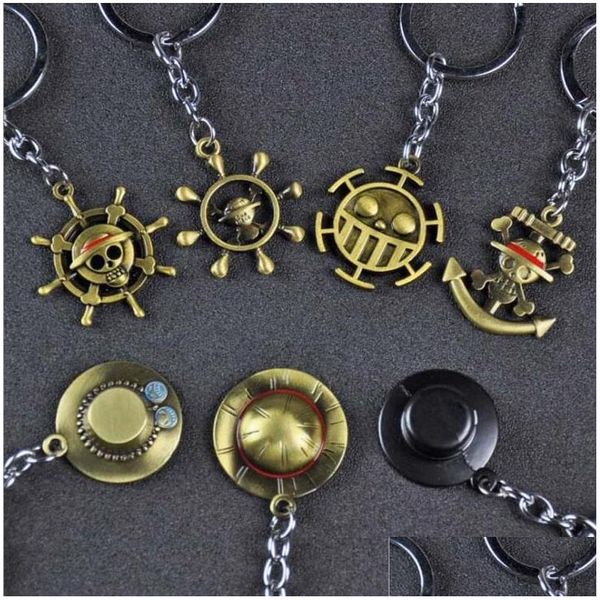 Porte-clés 10pcs / lot bijoux de mode porte-clés une pièce singe d. Luffy St chapeau gouvernail Skl pendentif porte-clés pour les fans cadeau de fête goutte Dhhv9