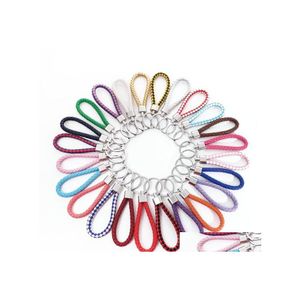 Porte-clés 40 Couleurs En Cuir Pu Tressé Tissé Porte-clés Fit Diy Cercle Pendentif Chaînes Titulaire De Voiture Porte-clés Bijoux Drop Delivery Dhept