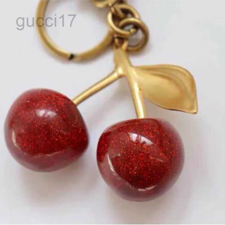 Key Rings Bag Charm Handbag Pendant Designer Handbags Keychain Womens Exquisite Internetfamous Crystal Cherry Car Acce NBKS