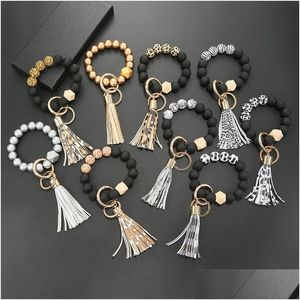 Sleutelringen Zwart glazuur Wood Bead Ring Luipaard Afdrukken Tassels Hanger Bracelet Keychain Women Sieraden Accessoires 6 8Jy Q2 Drop Deliv Ott8g