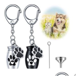 Porte-clés Urnes noires pour animaux de compagnie Porte-clés Chien pour cendres Petit souvenir Chat Crémation Bijoux Pend Paw Print Memorial Urn Drop Livraison Jewel Dhskz