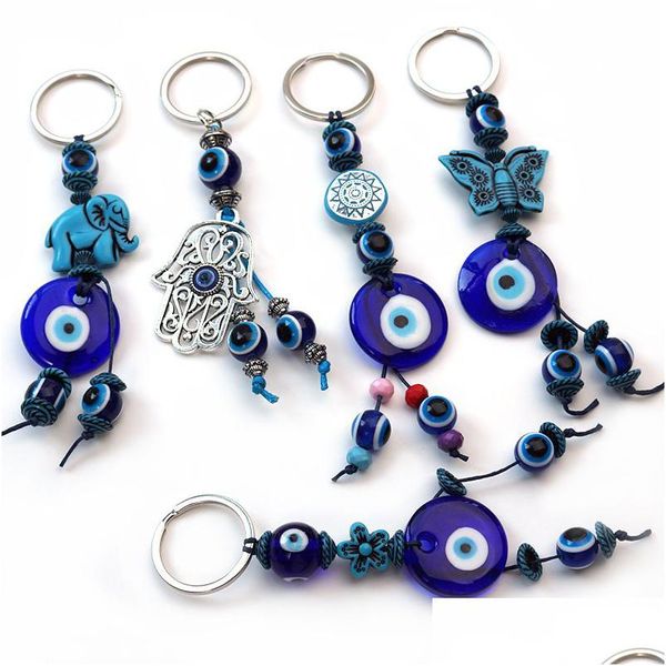 Porte-clés Blue Evil Eye Porte-clés Papillon Éléphant Palm Charms Bague Pour Femmes Hommes Pendentif Sac Accessoires De Voiture Drop Livraison Dhgarden Dh2Dy