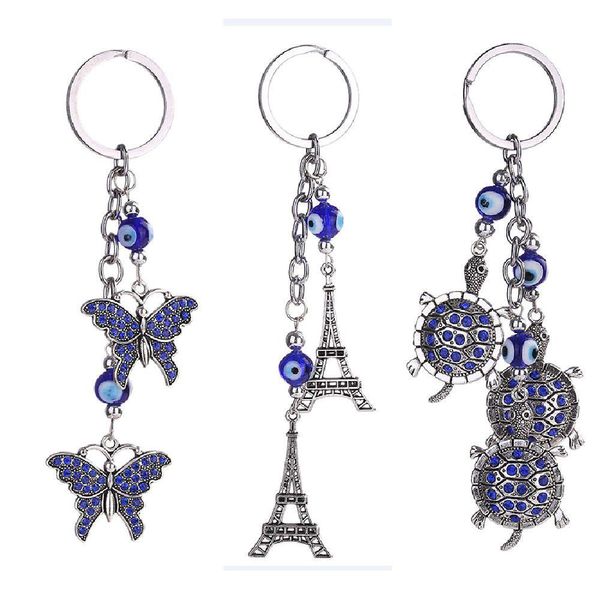 Llaveros Azul Mal de ojo Llavero Anillo Joyería Tortuga Torre Eiffel Llavero Moda Animales Mariposa Encantos Titular de cadena para bolsos Dhigw