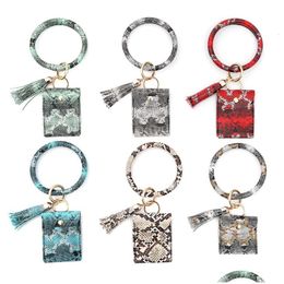 Sac de cartes clés Bracelet Kijou de bracelet Bijoux de bracelet Snake Pu Leather Tassel Purse Purse Car clés de voiture de voiture Fashion Round Keyring Dhxui
