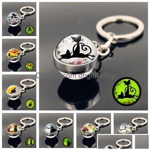 Porte-clés de dessin animé chat boule de verre porte-clés brillent dans le noir pendentifs porte-clés sac accroche bijoux de mode et bijoux Dhmt4