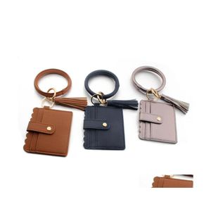 Sleutelringen cirkelpolspolband ring armband creditcard pocket lederen tassel pols bangle sleutelhanger meisje mode patroon sleutels fob q35fz dhtkx