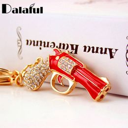 Anillos clave Lindo esmalte Revólver Magnum Pistola Llave de llave Soporte de cristal Purse Bolse Costeo para mujeres Keychanes de regalos K274 NUEVO