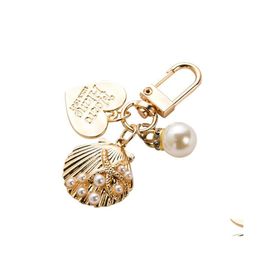 Key Rings Cute Pearl Shell For Girl Creative Small Gifts Ins Metal Sieraden Hanger Keychain Ladies Fashion Accessoires Drop Delivery OTPGS