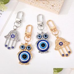 Sleutelhangers Boze Oog Hamsa Hand Uil Sleutelhanger Ring Voor Vrouwen Mannen Holle Fatima Blauwe Tas Auto Accessoires Drop levering Sieraden Dhrj9