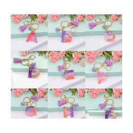 Porte-clés Lettres anglaises de couleur dégradée avec pompon paillettes paillettes porte-clés sac exquis suspendu pendentif bijoux cadeaux D Dhvs4